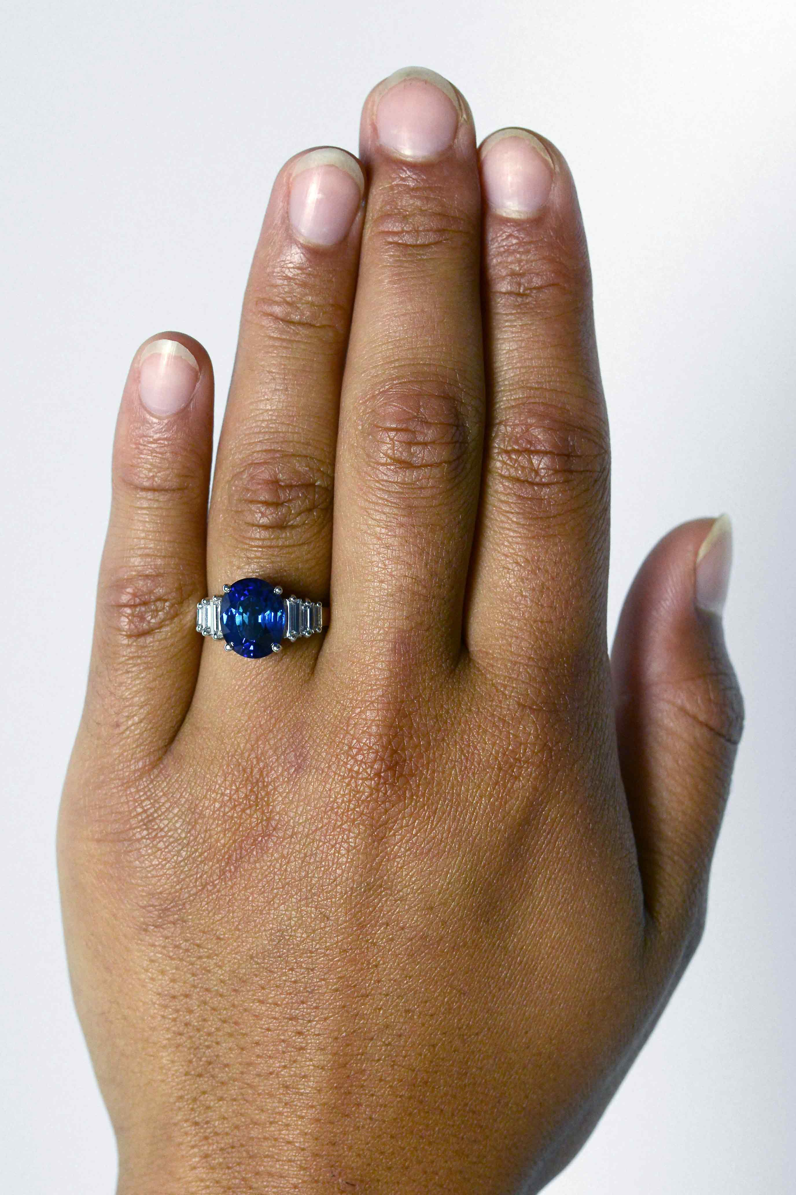 This size 7 Art Deco revival wedding ring has a 4 carat blue sapphire.